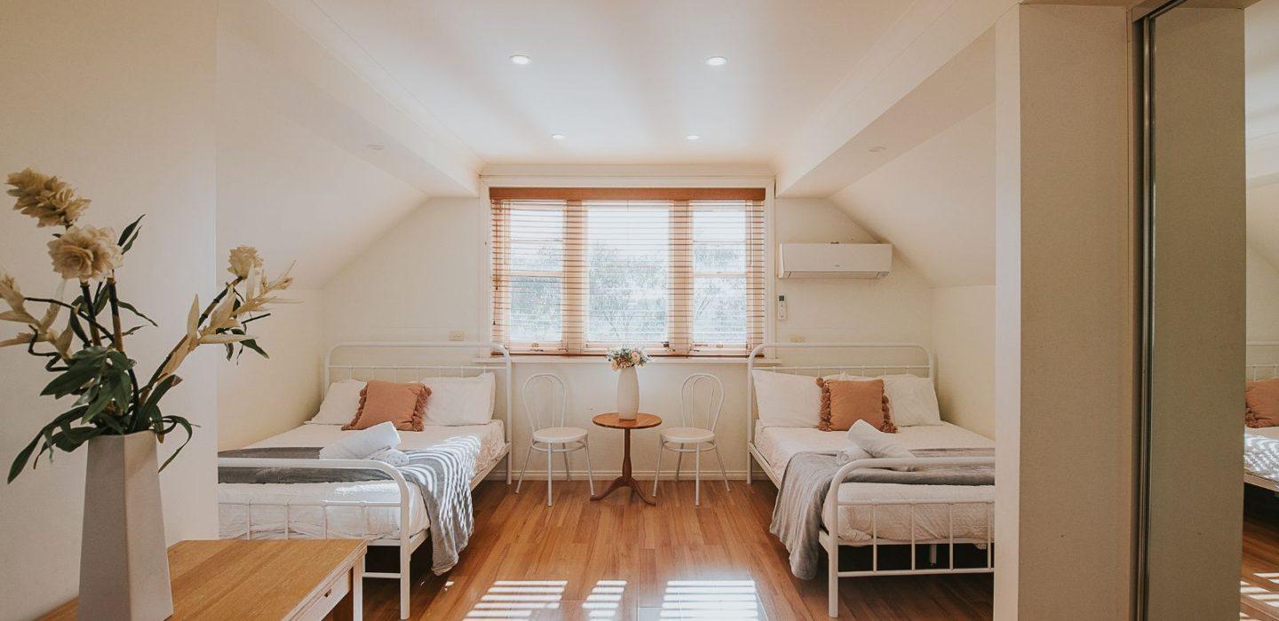 The Cottage can sleep four guests, with a spa suite on the ground floor and two single beds on the upper floor.
