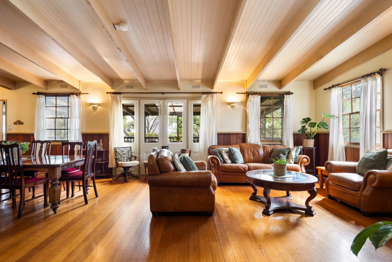 Timber-ceilinged lounge and dining hall